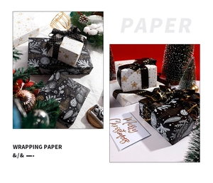 Macro view of luxury black and white Christmas wrapping paper with gold foil star patterns