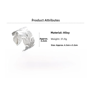 Detail view of silver leaf pattern metal cuff bracelet with 3.2cm width and 31.9g weight