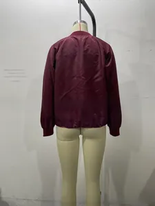 Rear view of wine red satin bomber jacket showing a smooth glossy fabric finish