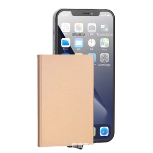 Macro detail of the brushed aluminum finish and slim flip cover on the RFID card holder