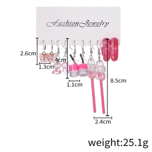5 pairs of pink resin earrings featuring butterfly, bear, bubble tea and lollipop charms