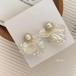 Elegant 925 silver needle pearl flower stud earrings with translucent layered petals