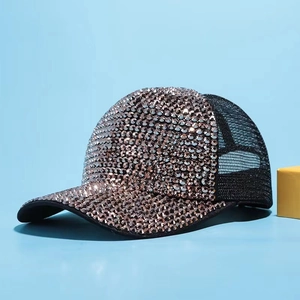 Detail of a breathable black baseball cap with sparkling champagne rhinestones and mesh
