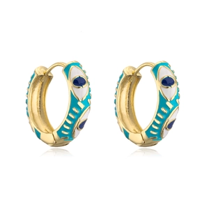 Detailed macro view of bohemian style turquoise evil eye hoop earrings in gold plating