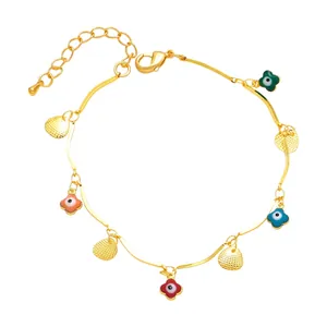 Gold plated bracelet with colorful enamel floral evil eye and textured shell pendants