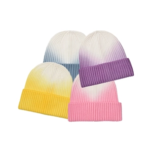 Women's gradient knit beanie hats in yellow, blue, purple, and pink for winter warmth