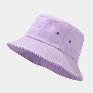 Detail of light purple cotton bucket hat showing metal eyelets and reinforced stitching