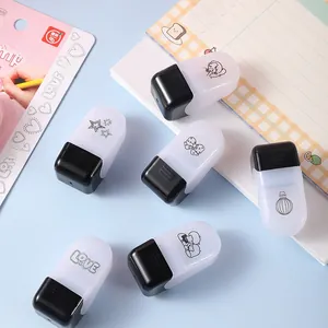 Macro view of cartoon animal rolling stamps and decorative DIY stationery patterns