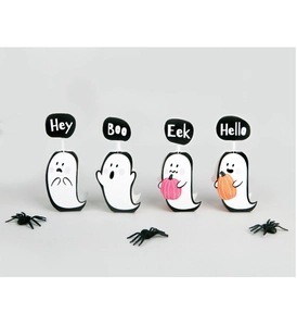 Close-up of cute ghost lollipop cards with Hey Boo Eek text and toy spiders decoration