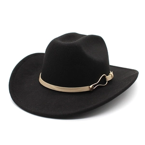 Close-up of a black wool felt cowboy hat featuring a beige leather band and gold buckle