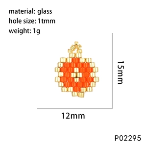 Detail view of woven glass bead charm in orange and gold with specific dimensions