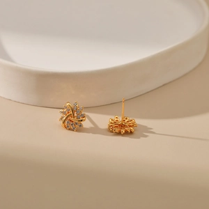 Exquisite 18K gold plated snowflake stud earrings with sparkling cubic zirconia stones