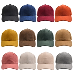 Detailed view of faux suede baseball caps showing twelve solid colors in a grid layout