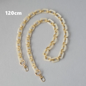 Detailed 120cm off-white acrylic resin bag strap with gold metal links and clasps