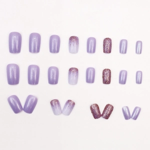 Sparkling aurora purple press-on nails set with glitter and solid color gradients