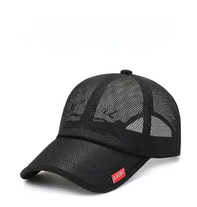 Detail of black mesh baseball cap with A-KUBIZ embroidery and a red side label