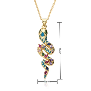 Detailed view of gold snake pendant with blue enamel and jewels, measuring 38mm by 12mm