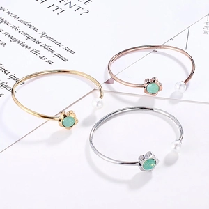 Adjustable open bangle with green floral gemstone and pearl in gold silver and rose gold