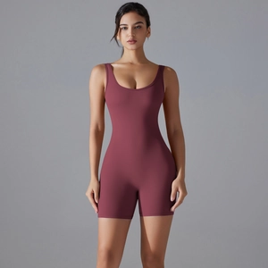 Detail view of burgundy high-stretch yoga bodysuit with U-neck and bodycon fit