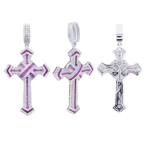 Three-angle macro view of silver cross pendant with pink gemstones and clear zirconias