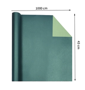 Detail view of dark green gift wrapping paper roll sized 1000 cm by 43 cm dimensions