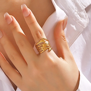 Golden irregular liquid metal style lava ring with adjustable multilayer design on finger