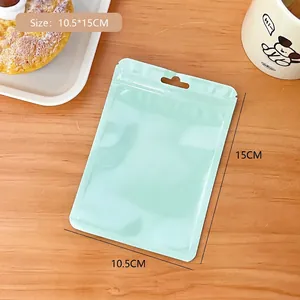 Detail of mint green resealable plastic bag with top hanging hole size 10.5x15cm