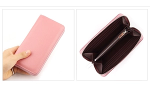 Detailed view of pink leather wallet interior with multiple card slots and zipper pocket