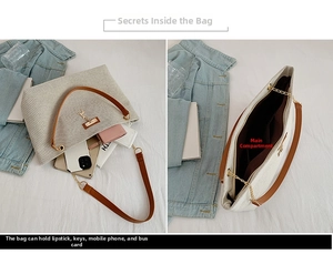 Detailed interior view of a canvas tote bag showing large capacity and elk charm