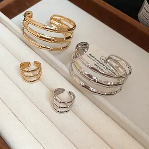 Minimalist multi-layer bamboo style open bracelet and ring set in gold and silver finish
