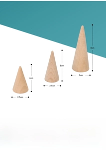 Three-piece solid wood cone ring display stands with natural grain and varying heights