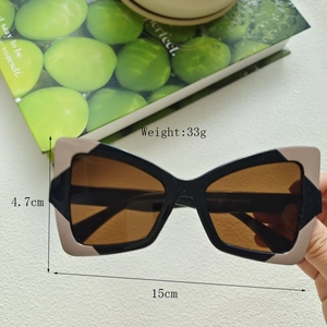 Detail of cat eye glasses frame showing 15cm width and 33g weight measurements
