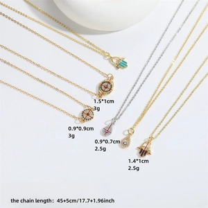 Exotic Evil Eye and Hamsa hand waterdrop pendant necklaces in gold and silver finish