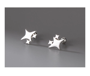 Macro shot of silver S999 four-pointed star stud earrings with screw back design