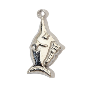 Polished silver stainless steel fish pendant macro view with metallic sheen on white background