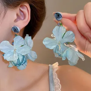 Blue fabric floral tassel earrings with silver needle and crystal drop for beach vacations