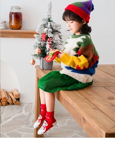 Kid's Christmas outfit with knit sweater, sparkly skirt and snowman embroidery socks