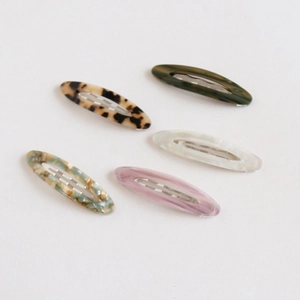 Lot de barrettes ovales en acétate coloris léopard, vert marbré et blanc nacré