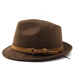Macro view of dark brown faux suede fedora featuring decorative band and metal buckle