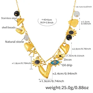 Detailed view of stainless steel necklace charms with natural stone and zircon elements