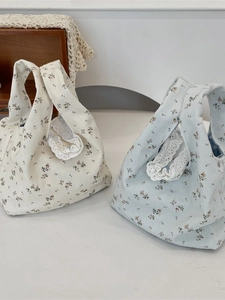 Floral corduroy wrist bag with lace trim in cream and blue, cute mini tote for women