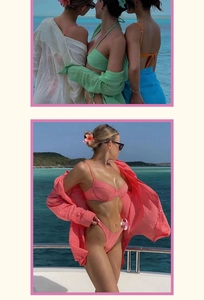 Detail shot of vibrant bikini sets and matching beach cover-ups on a luxury yacht