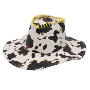 Western cowboy hat with brown cow print pattern and yellow contrast stitching on brim