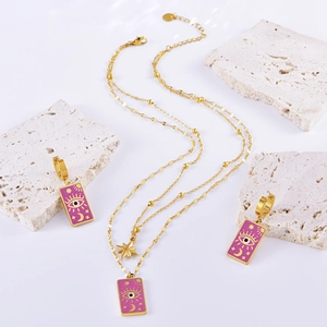 French vintage gold plated necklace and earrings set with purple enamel star and eye charms