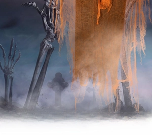 Close-up of orange Halloween hanging ghost with skeletal hands and tattered gauze veil