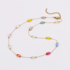 Detail of colorful rectangular beads on a 304 stainless steel gold link necklace chain