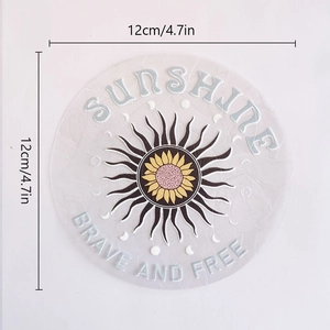 Detail showing a 12cm sunflower suncatcher prism sticker with rainbow PVC texture