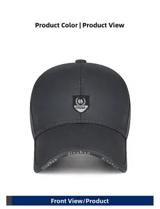 Detail of dark grey business casual cap featuring shield embroidery and lettered brim decoration