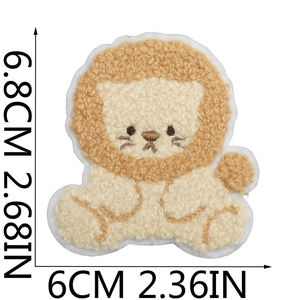 Detail view of lion embroidery patch with orange fleece texture and 6.8cm size measurements