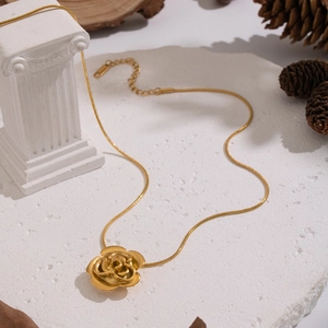 Elegant vintage gold rose pendant necklace on a sleek snake chain for women